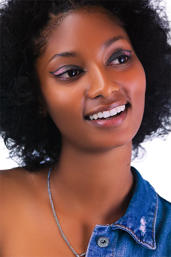 Smiling woman in a soft close-up portrait, representing warmth, intimacy, and romantic connection.
