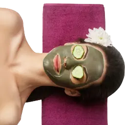 Relaxing woman with a facial mask and cucumber slices for the Relaxing vibe quiz result